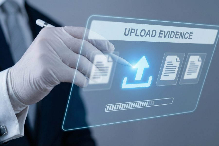 A businessman uploading digital evidence on a virtual interface